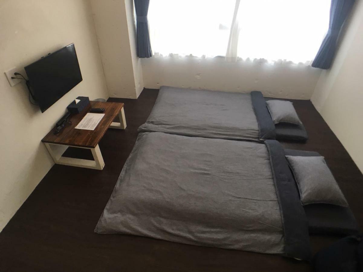 Guest House Golden Mile Hostel Amami Buitenkant foto